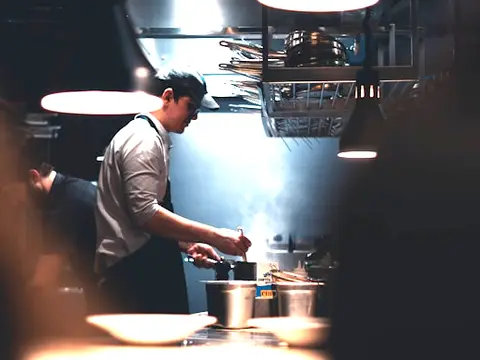 Chef cooking in a restaurant kitchen
